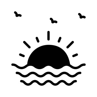 Okyanusun üzerinde gün batımı tropikal tatilleri ve rahatlamayı temsil ediyor..