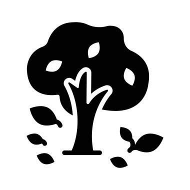 Düşen yapraklı ağaç, sonbahar havasını ve değişimi simgeliyor..