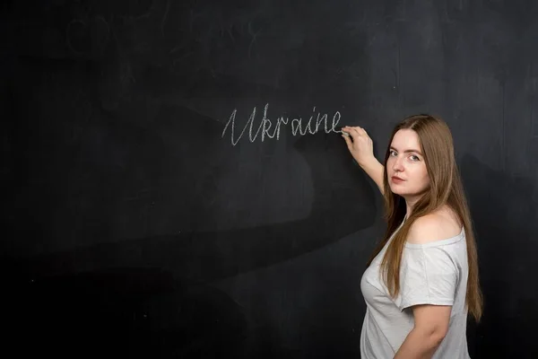 Girl European Appearance Writes Ukraine Chalk Slate Wall — Stock Photo, Image