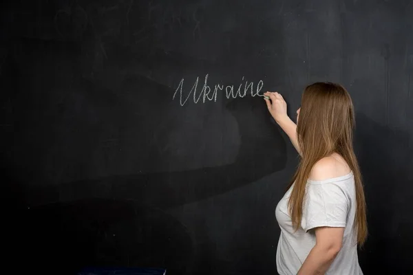 Girl Writes Ukraine Chalk Slate Wall — Stock Photo, Image