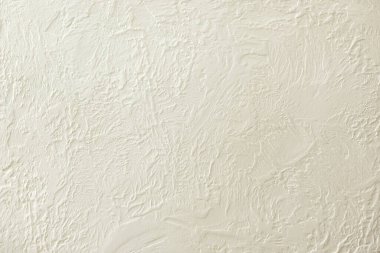 İç tasarım ve inşaat projeleri için mükemmel, karmaşık desenleri olan desenli beyaz alçı duvar arka planı. Yaratıcı ve ticari kullanım için yüksek çözünürlüklü resim ideal.