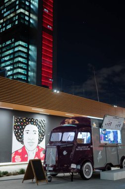 Madrid. Spain; March 1, 2023: A food truck sells food in the hot tower until late at night