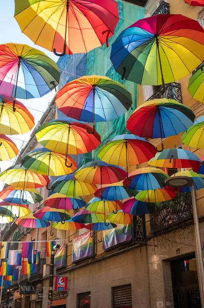 stock image Colorful Umbrellas Hanging in the Street During Pride Celebration - July 4, 2024 - Madrid, Spain