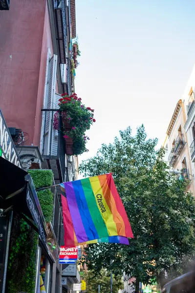 stock image Rainbow Flag Hanging from Balcony in Chueca Neighborhood - July 4, 2024 - Madrid, Spain