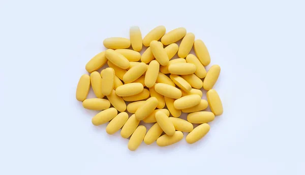 Zbliżenie Tekstury Żółtych Tabletek Multiwitaminowych Białym Tle Koncepcja Zdrowego Stylu — Zdjęcie stockowe