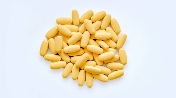 Close Textuur Van Gele Multivitamine Tabletten Witte Achtergrond Gezond Levensstijl — Stockfoto