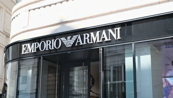 stock image Vienna, Austria - April 22, 2023: Close-up sign of the Emporio Armani boutique in the city center..