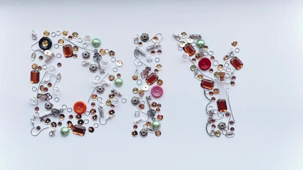 Diy这个词是由珠宝制品制造出来的 手工制作概念 — 图库视频影像
