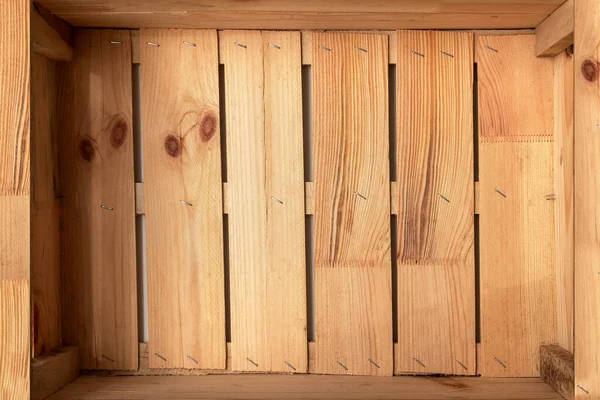 stock image Opened wooden box. Wooden background.