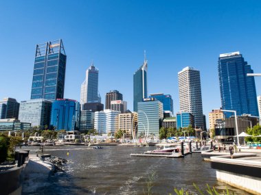 Perth City skyline viewed from Elizabeth Quay in early morning sunlight. PERTH, WESTERN AUSTRALIA.