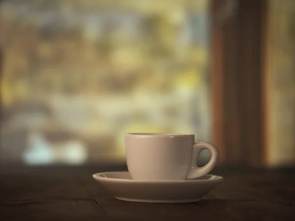 Cozy espresso moment, sunlit window.