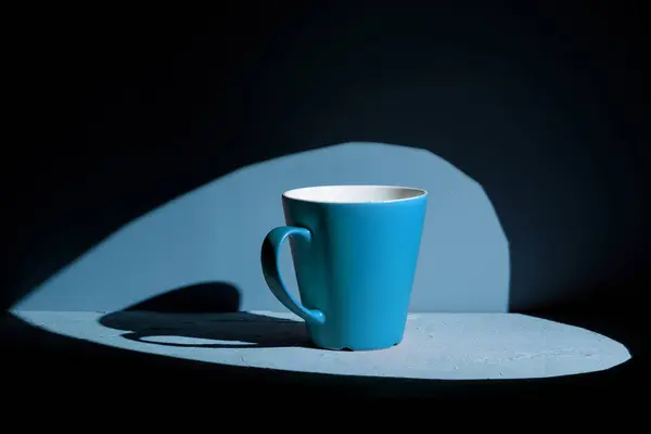 stock image Simple blue ceramic mug on blue background