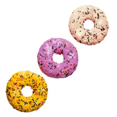 Neşeli minimalist düzende izole edilmiş canlı serpiştirilmiş renkli donutlar.