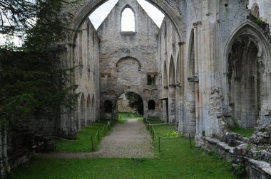 Front View Of The Ruin Of The Jumieges Abbey In Normandy France On A Beautiful Sunny Summer Day With A Few Clouds In The Sky