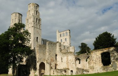Front View Of The Ruin Of The Jumieges Abbey In Normandy France On A Beautiful Sunny Summer Day With A Few Clouds In The Sky