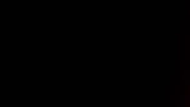 プリズムレインボーライトフレアがブラックを背景にオーバーレイ — ストック動画