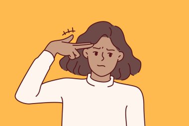 Sırıtan bir kadın silah hareketi yapar, özel hayatındaki sorunlarla ilgili intihar benzetmesi için parmaklarını şakağına koyar. Genç kız ilişki sorunlarından sonra intihar etmek istiyor.