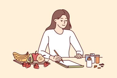 Kadın beslenme uzmanı, müşterileri için meyve ve haplarla dolu bir diyet planı yapıyor. Kız beslenme uzmanı farmakolojinin yerine alternatif beslenme formülü ile gelir.