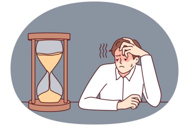 Exhausted businessman looking at hourglass feel bored and overwhelmed. Tired male employee look at sand clock wait for working day end. Vector illustration.