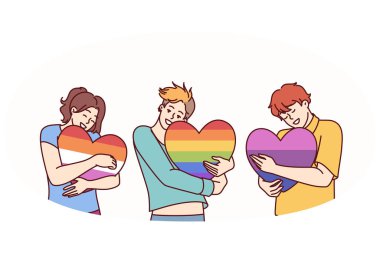 LGBT ve LGBTQ bayraklarıyla boyanmış kalpleri kucaklayan insanlar seks ve yaşam tarzında seçim özgürlüğü sağlıyor. LGBT gurur topluluğundan veya cinsiyet değiştirenler için toplumsal hoşgörü kavramı