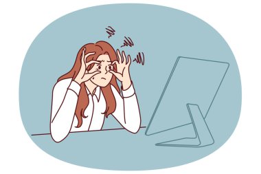 İş yerinde monitörle oturarak uyanık kalmaya çalışan uykulu iş kadını aşırı çalışma nedeniyle yorgun hissediyor. İş kadını vizyon sorunları ve katı teslim tarihleri yüzünden ofis işi yapıyor.