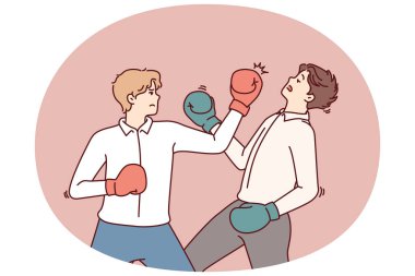 Boks eldivenli kararlı iş adamı rakibinin yüzüne vuruyor ve çalışanlar arasındaki sert rekabeti simgeliyor. İş elbiseli adamlar, yönetici olarak yükselme hakkı için mücadele ediyorlar.