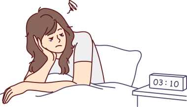 Yorgun bir kadın yatakta uykusuzluk çekiyor.