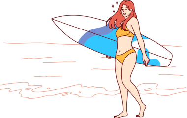 Bikini giymiş kadın sörf tahtası ile sahil boyunca yürüyor ve adaya yaz yolculuğunun tadını çıkarıyor.