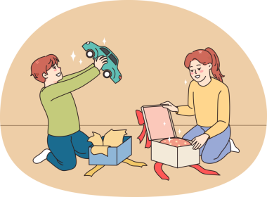 Heyecanlı çocuklar hediye kutularını açarlar.