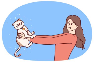 Kadının kedi yavrusuna ve evcil hayvandan uçan kürke alerjisi var ve alerji önleyici ilaç alması ya da alerji uzmanına görünmesi gerekiyor. Kedilere karşı alerjik reaksiyon gösteren bir kız korkuyla sevimli bir hayvana bakar.
