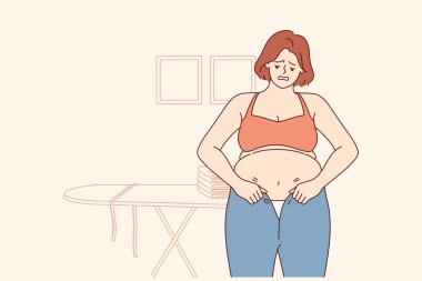 Aşırı kilolu bir kadın küçük pantolon giymeye çalışır ve diyete ihtiyaç duyar. Aşırı kilolu bir kız, obezitenin sebep olduğu karın ve selülit görüntüsünden dolayı kıyafetlere sığmaz.