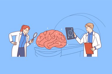 Hastanın hafıza ve zeka yeteneklerini araştırmak için insan beyninin tomografisi ve bilimsel çalışmaları. Genç tıbbi personel tomografi için makinenin yanında duruyor ve beyin röntgeni çekiliyor.