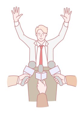 Heyecanlı ve kendinden emin bir konuşmacı basın etkinliği sırasında coşkuyla el kaldırıyor.