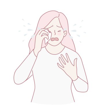 Sıkıntılı bir ifade takınan bir kadın görünür bir şekilde duygusal acı gösterir, derin hassasiyetini ve karmaşasını gösterir