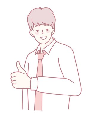 İş kıyafeti giymiş kendine güvenen genç bir adam pozitifliğini ve onayını baş parmağıyla gösterir..