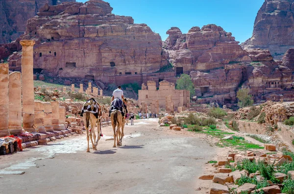 stock image Petra, Jordan - April 16 2023: The Colonnade Street that runs through the center of of the Ancient City, with many unexcavated sites on either side and the temple of Qasr al-Bint (Dushares) up front.