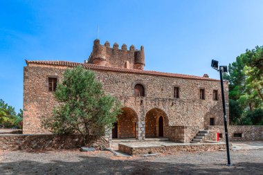 Tzannetakis tower, a magnificent traditional fortified mansion that was built in 1829 and now it houses a small museum to retrace the history of Mani. In Cranai (also Marathonisi) island, Gythio, Mani, Peloponnese, Greece. clipart