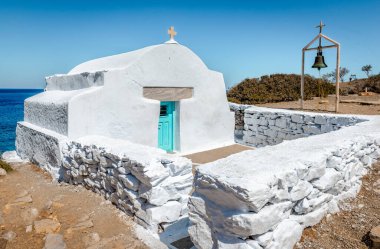 The chapel of Agia Anna, on the famous homonymous beach, since scenes the film 'The Big Blue' were shot there. In Amorgos Island, Cyclades, Greece. clipart