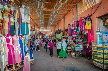 Marrakesh, Morocco - February 18 2024: View of the souk in Jemaa el-Fnaa, the famous square at the medina quartet. clipart