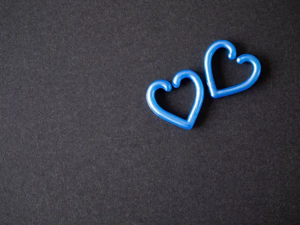 Two Blue Heart Black Paper Background Top View Flat Lay — Stock Photo, Image