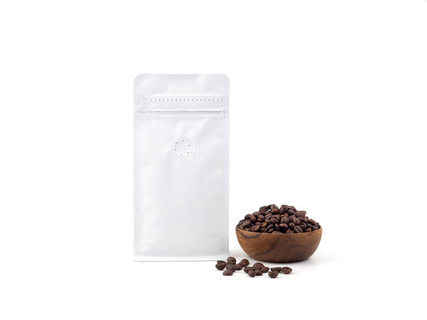 Foil plastic paper bag packaging with vacuum-sealed, zipper and wooden bowl for roasted coffee beans template isolated on a white background. Package mock-up for coffee or dry seeds product