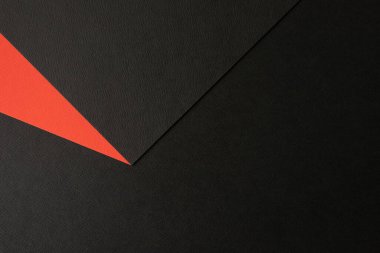 İki tonluk siyah ve kırmızı renkli kağıt arka plan. Görüntü, metin ve tasarım için kavram. Geometrik kağıt fon. Soyut kağıt dokusu veya arkaplan.