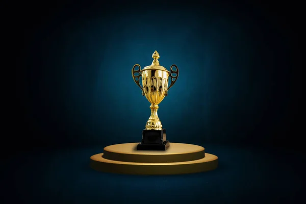 Golden Royal Awards, Gold champion trophies on stage or podium to present product on dark blue cement wall and vintage backdrop studio background, 3D render
