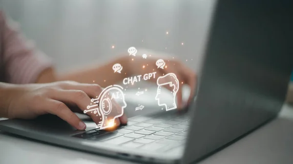 ChatGPT Chat with AI or Artificial Intelligence. woman chatting with a smart AI or artificial intelligence using an artificial intelligence chatbot developed by OpenAI.