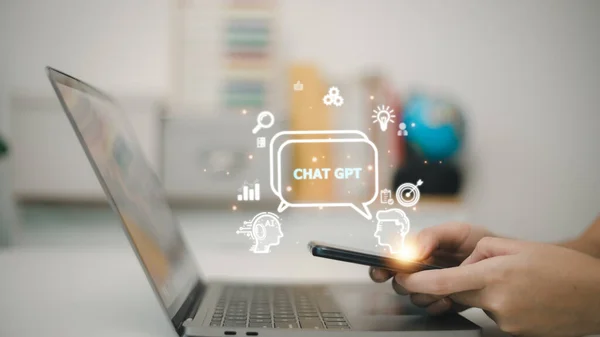 stock image ChatGPT Chat with AI or Artificial Intelligence. woman chatting with a smart AI or artificial intelligence using an artificial intelligence chatbot developed by OpenAI.