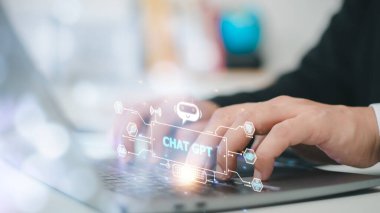 ChatGPT Chat with AI or Artificial Intelligence. Business chatting with a smart AI or artificial intelligence using an artificial intelligence chatbot developed by OpenAI.