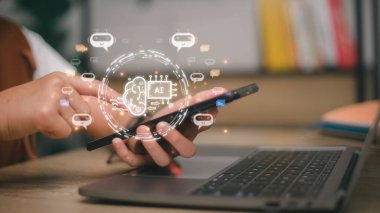 Businesswoman using chatbot in computer smart intelligence Ai. Chat GPT Chat with AI Artificial Intelligence, developed by OpenAI generate. Futuristic technology, robot in online system.