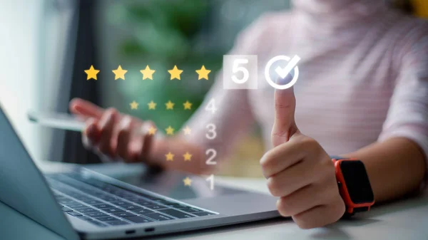 Customer can evaluate quality of service leading to reputation ranking of business. User give rating to service experience on online application, Customer review satisfaction feedback survey concept.