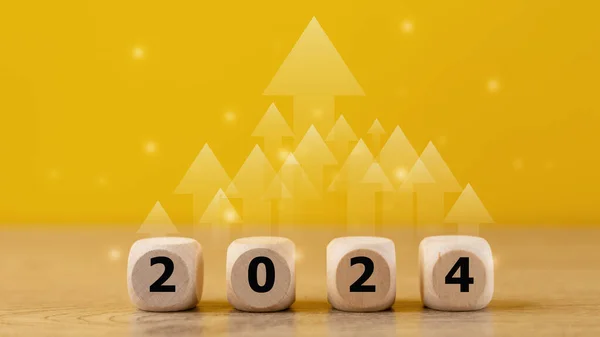 2024 goals of business or life. Wooden cubes with 2024 icon. Starting to new year. Business common goals for planning new projects, annual plans, business target achievement