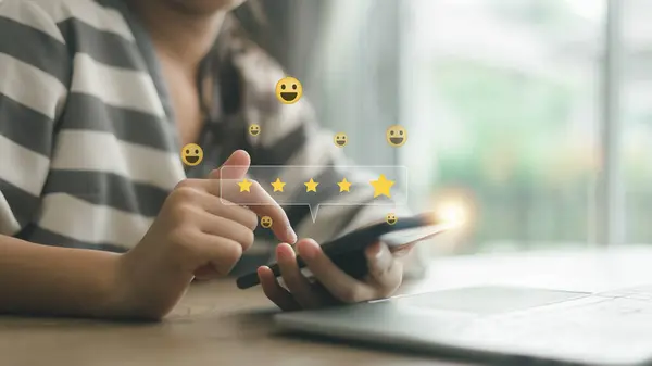 Customer service satisfaction concept. Positive emotion smiley face icon and five stars with copy space. Satisfied, feedback, review, good, best, good product and service, quality